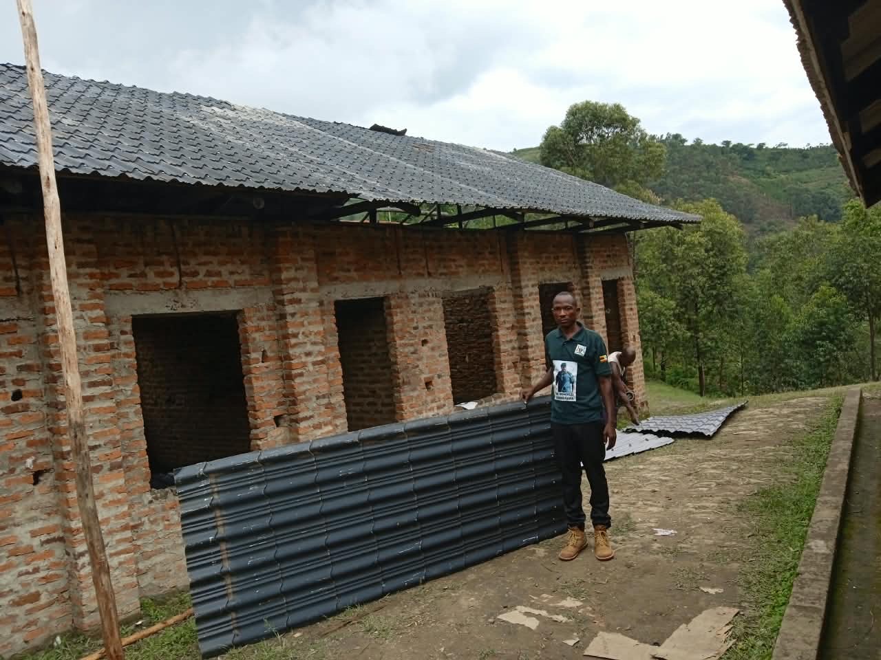 Atukwatse Edson’s Intervention Pays Off as Munyonyi Primary School Receives 150 Iron Sheets